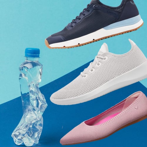 three shoes positioned beside a plastic water bottle